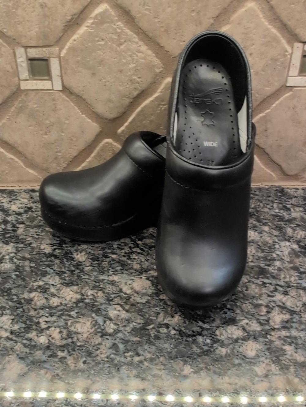 Dansko Black Slip-On Clog Shoes